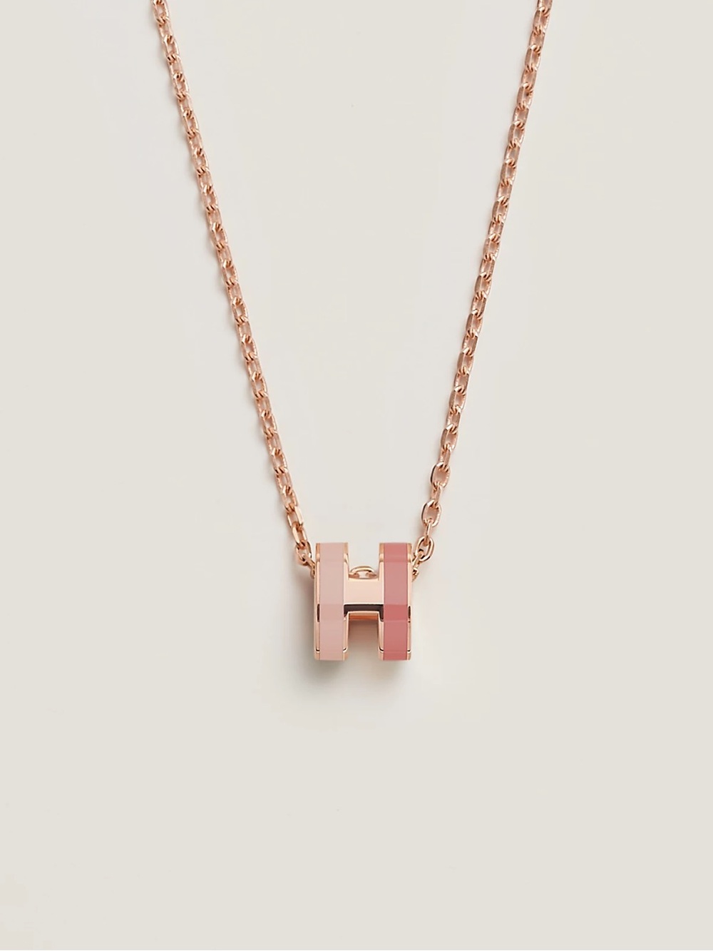 Hermes: Pink Rose Gold-Plated Mini Pop H Rocabar Pendent Necklace